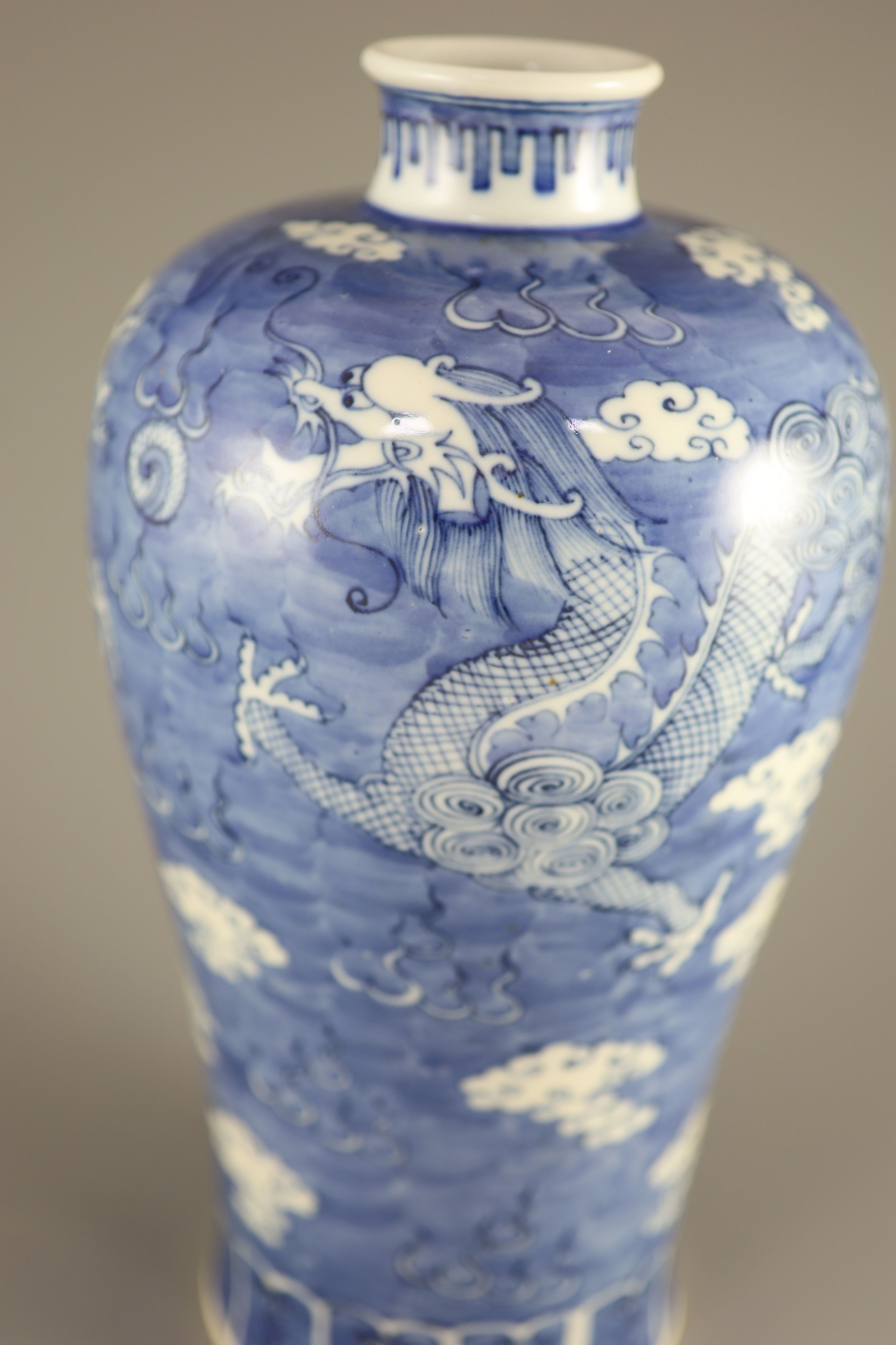 A Chinese blue and white 'dragon' meiping, Kangxi mark but 19th century, 33.5cm high